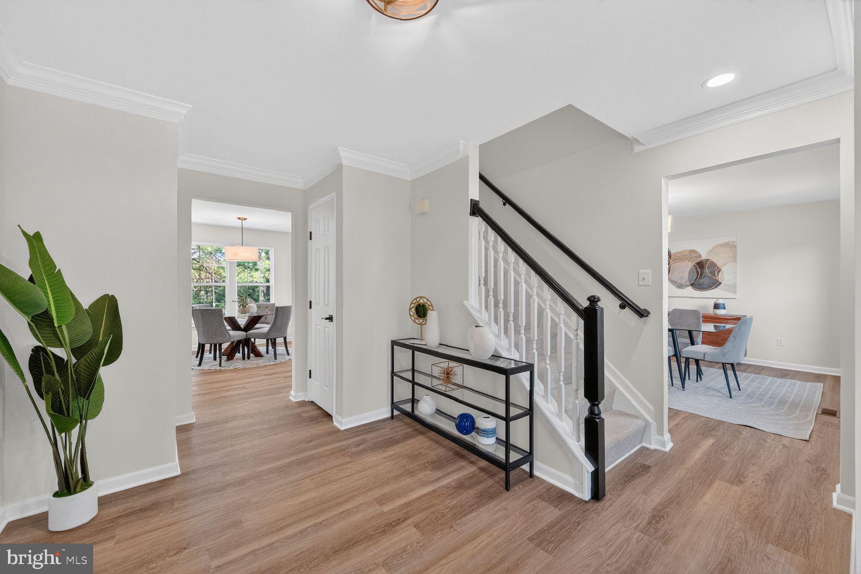 2339 Colts Brook Drive Reston, VA 20191 - Photo 4 of 51 a living room with furniture and a wooden floor