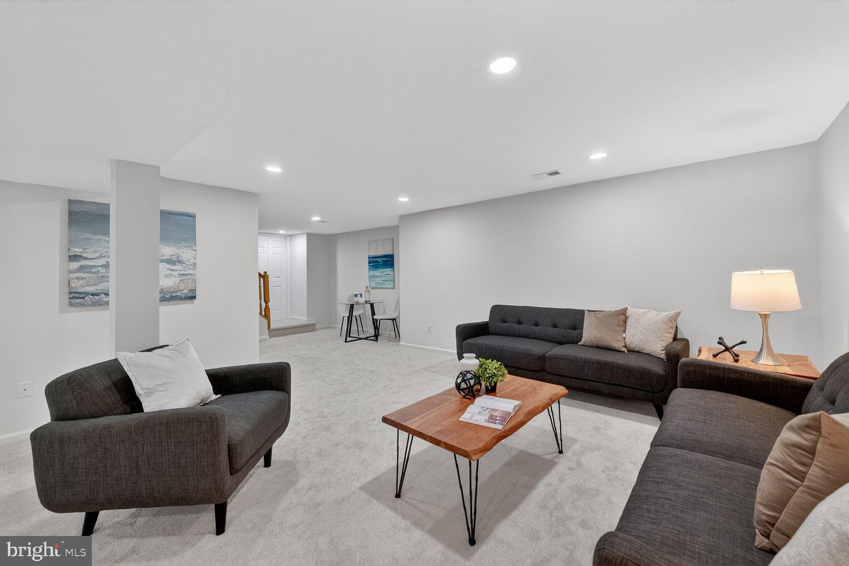2339 Colts Brook Drive Reston, VA 20191 - Photo 41 of 51 a living room with furniture and a couch