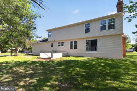 a view of a house with a swimming pool
