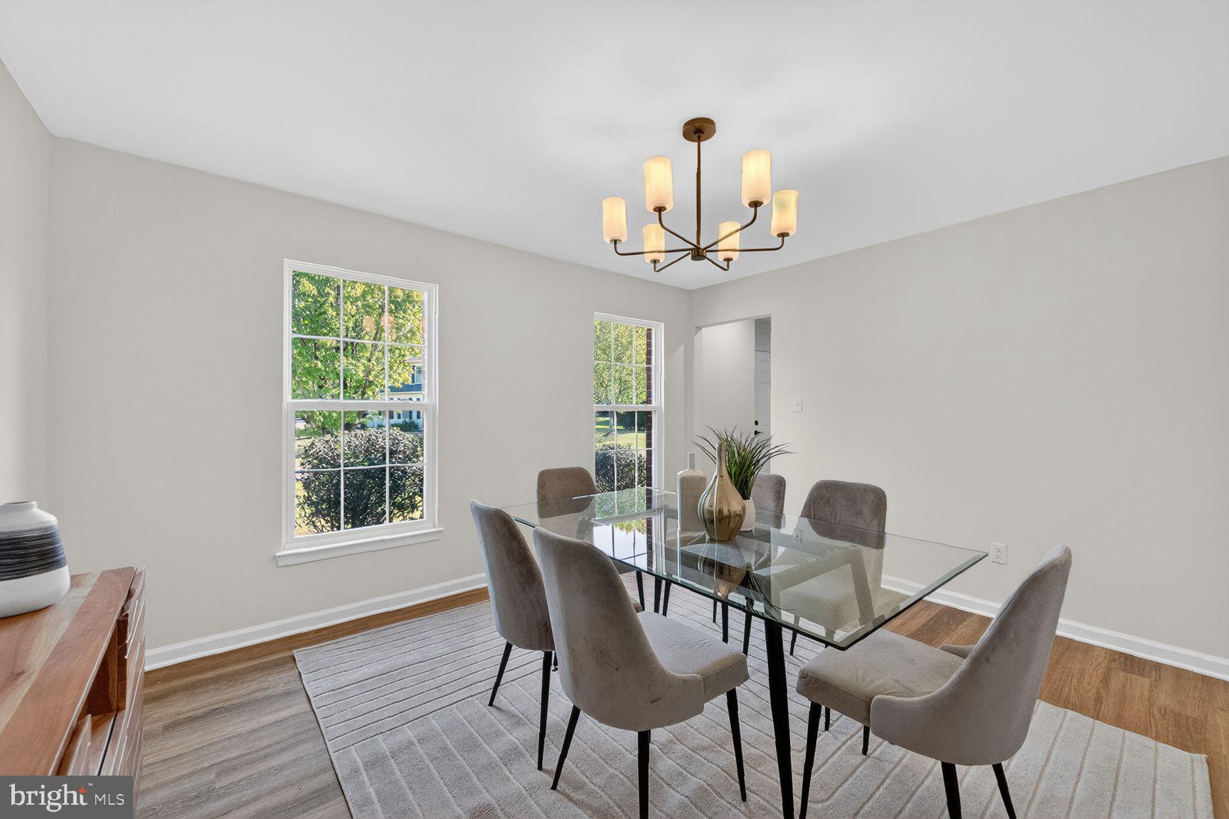 2339 Colts Brook Drive Reston, VA 20191 - Photo 10 of 51 a view of a dining room with furniture and wooden floor