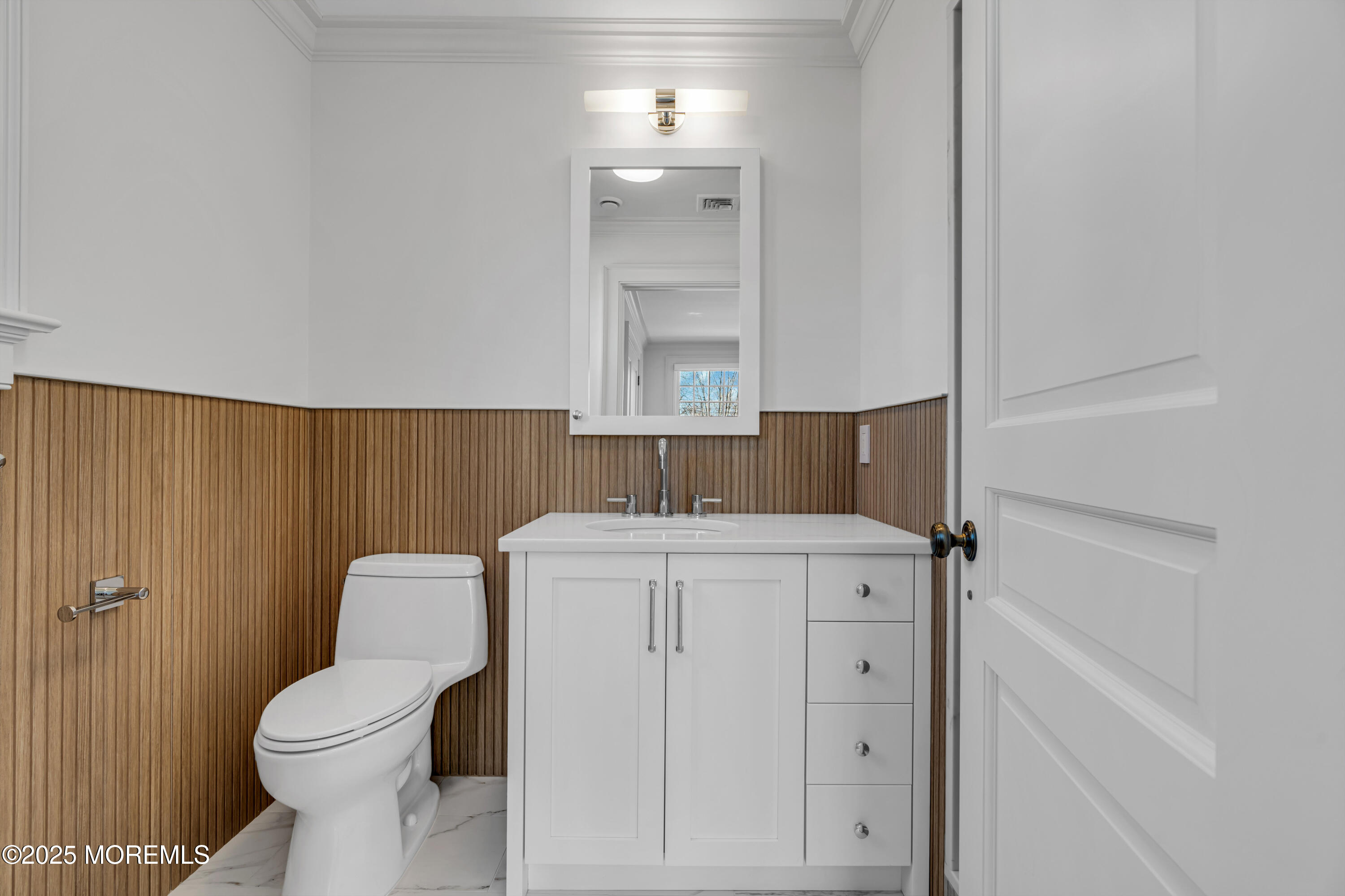 327 South Boulevard Spring Lake, NJ 07762 - Photo 62 of 107 a bathroom with a sink a toilet and vanity