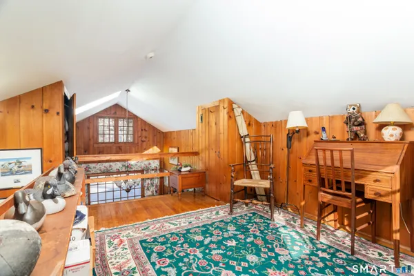 a view of a living room with furniture