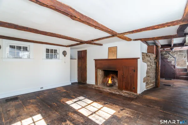 a view of a livingroom with a fireplace