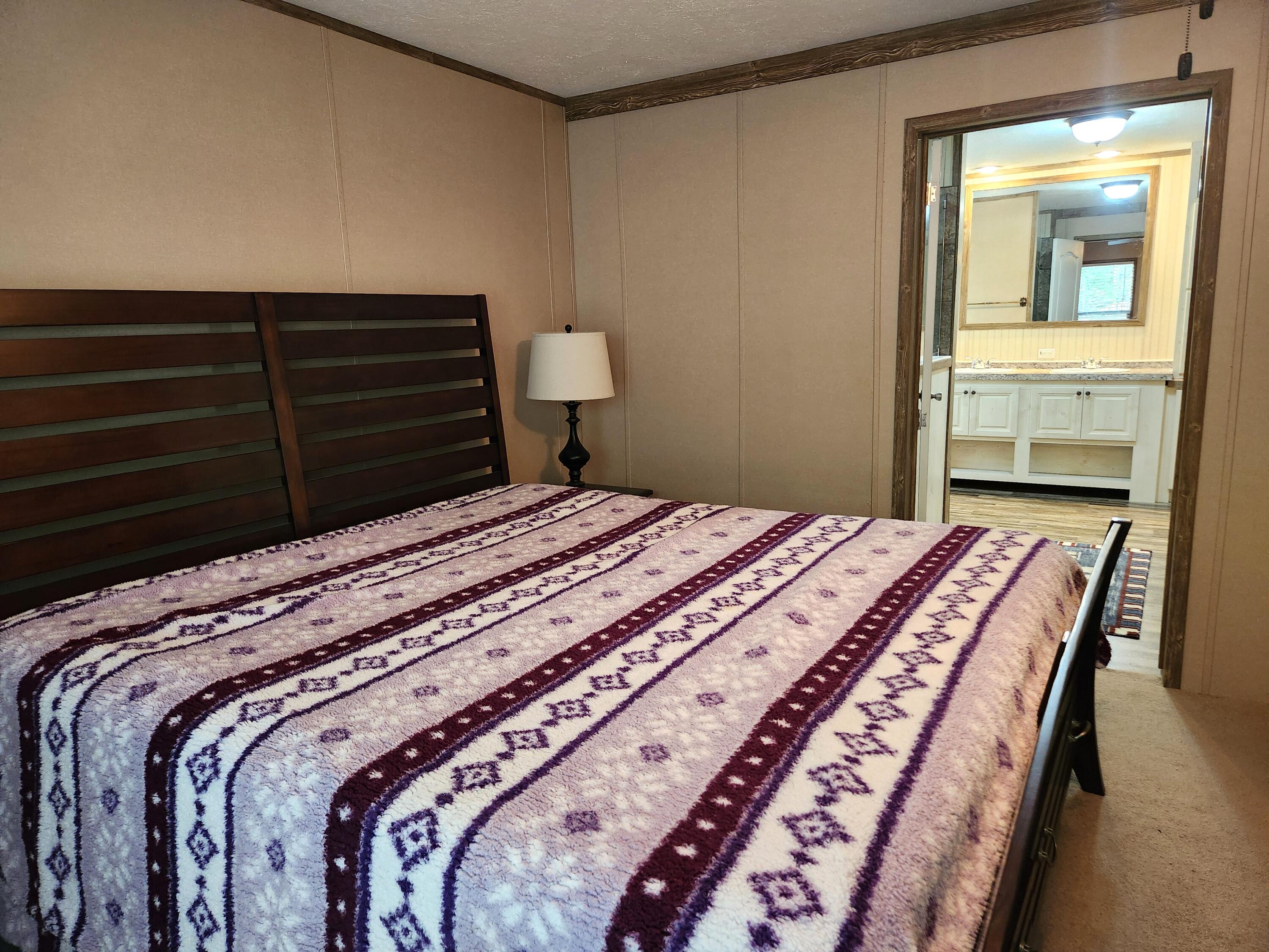 300 Whisperway Road Moneta, VA 24121 - Photo 13 of 24 a bedroom with a bed and dresser