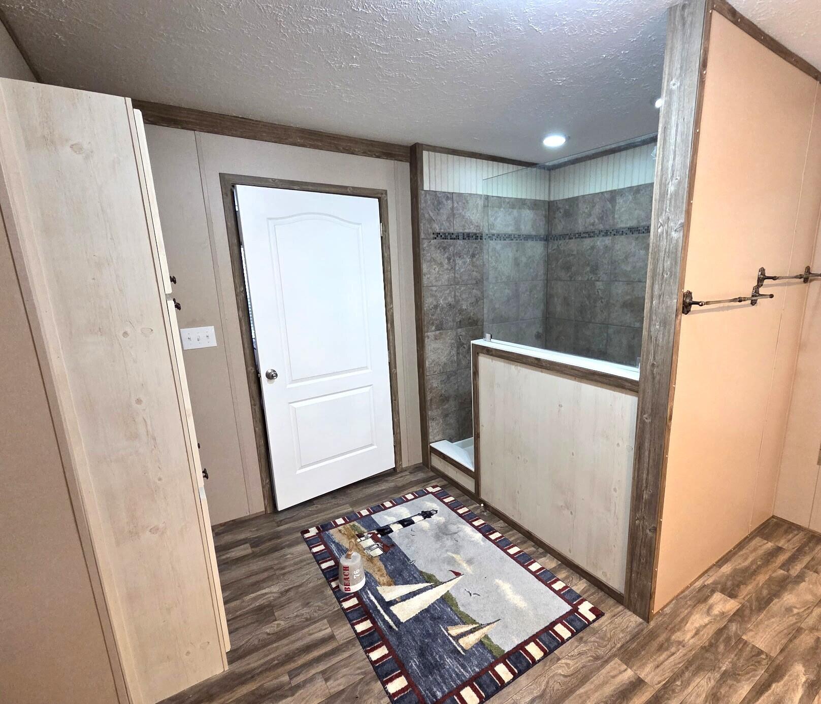 300 Whisperway Road Moneta, VA 24121 - Photo 14 of 24 an empty room with wooden floor