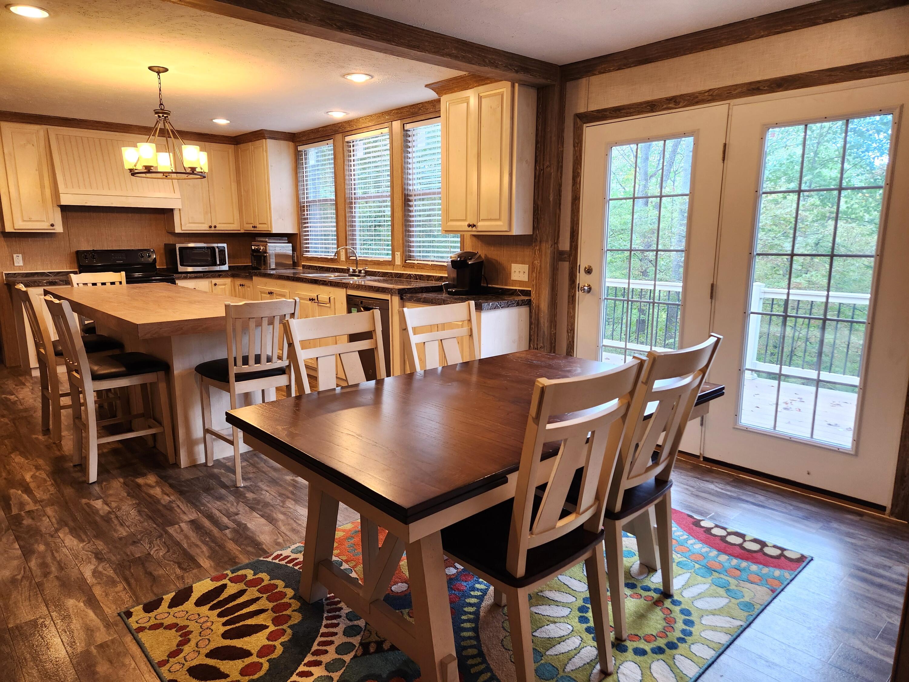 300 Whisperway Road Moneta, VA 24121 - Photo 7 of 24 a view of a dining room with furniture window and wooden floor