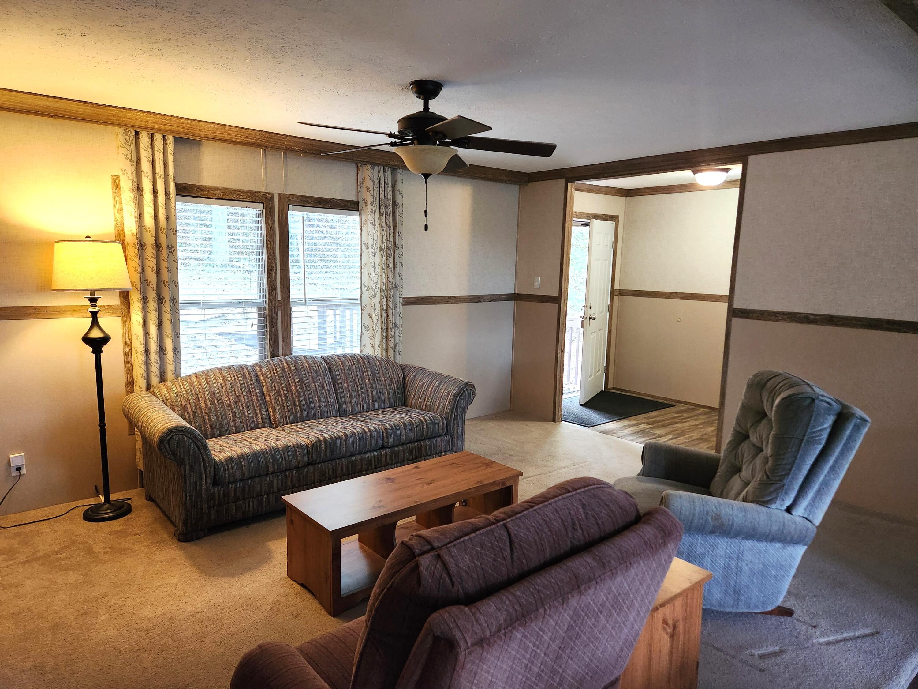 300 Whisperway Road Moneta, VA 24121 - Photo 10 of 24 a living room with furniture and a window