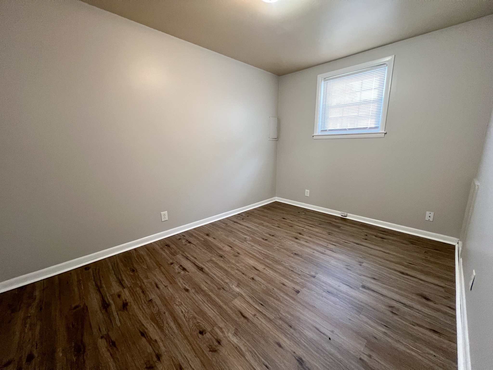 701 Power Street, Unit 4 Clarksville, TN 37042 - Photo 6 of 10 wooden floor in an empty room