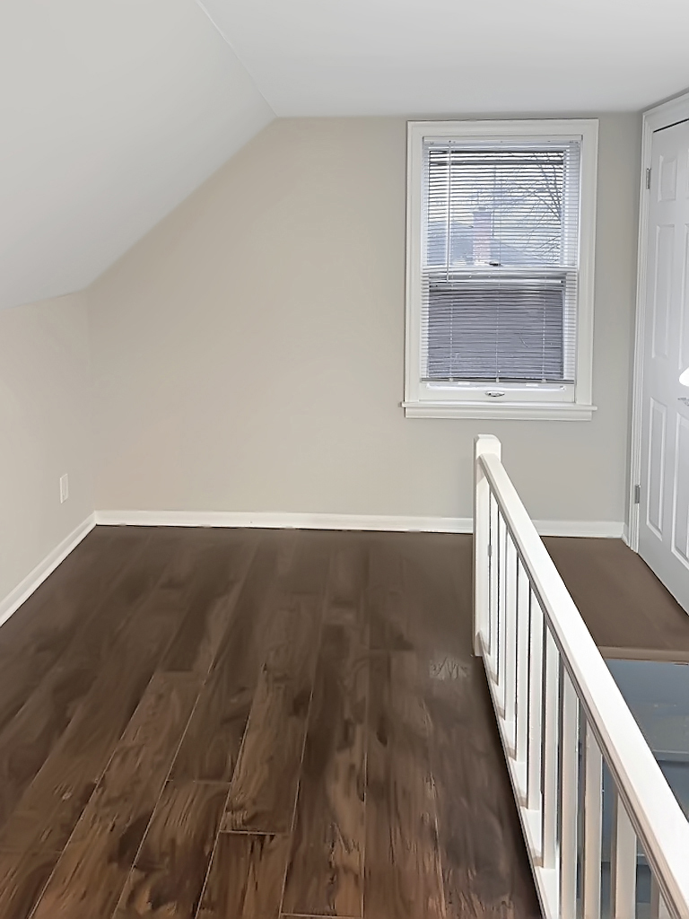 28 West 35th Place Steger, IL 60475 - Photo 14 of 20 a view of a hallway with wooden floor and staircase