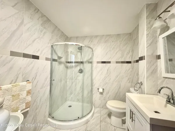 a bathroom with a toilet and a sink