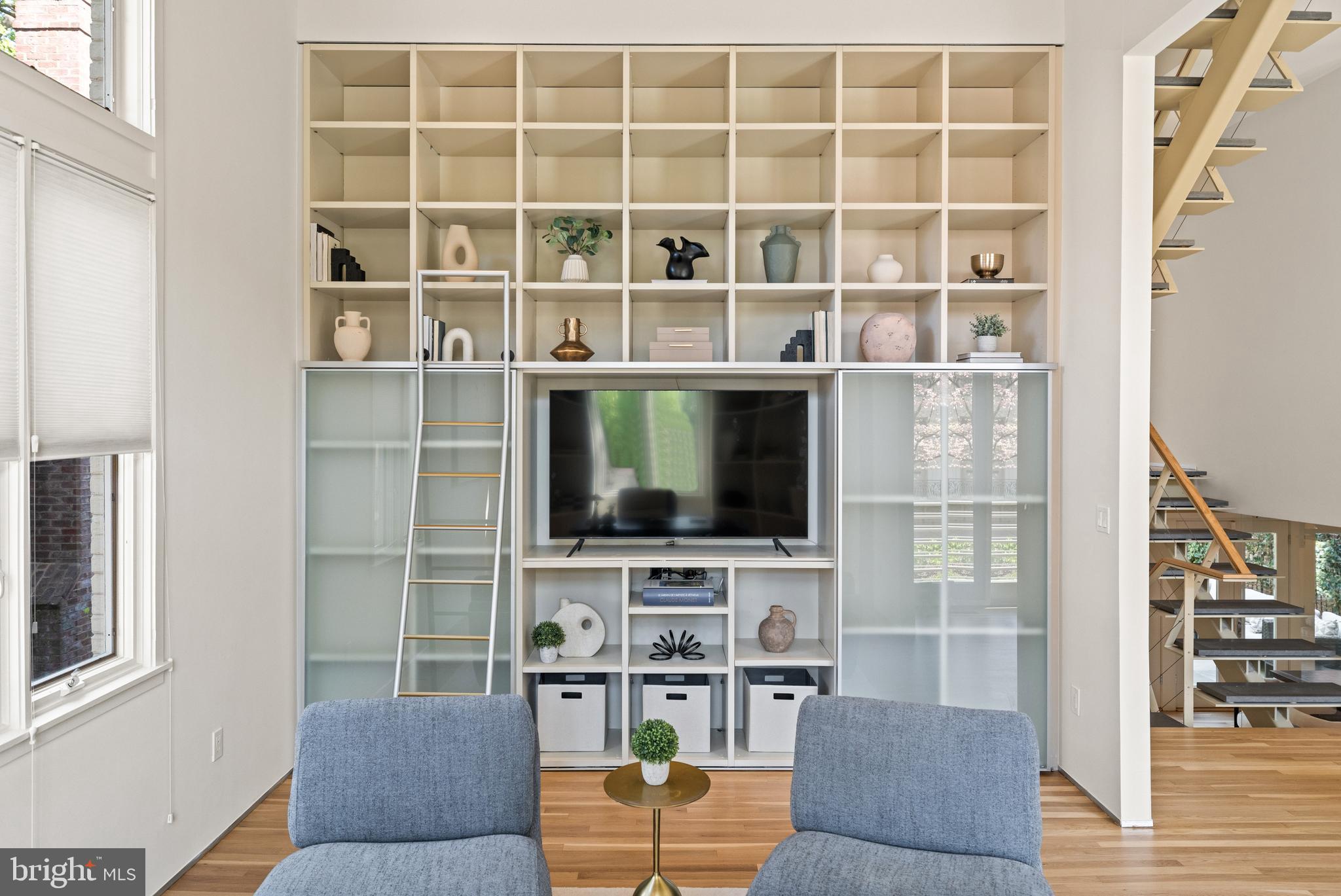 2319 Bancroft Place Northwest Washington, DC 20008 - Photo 13 of 37 a living room with furniture a rug and a flat screen tv