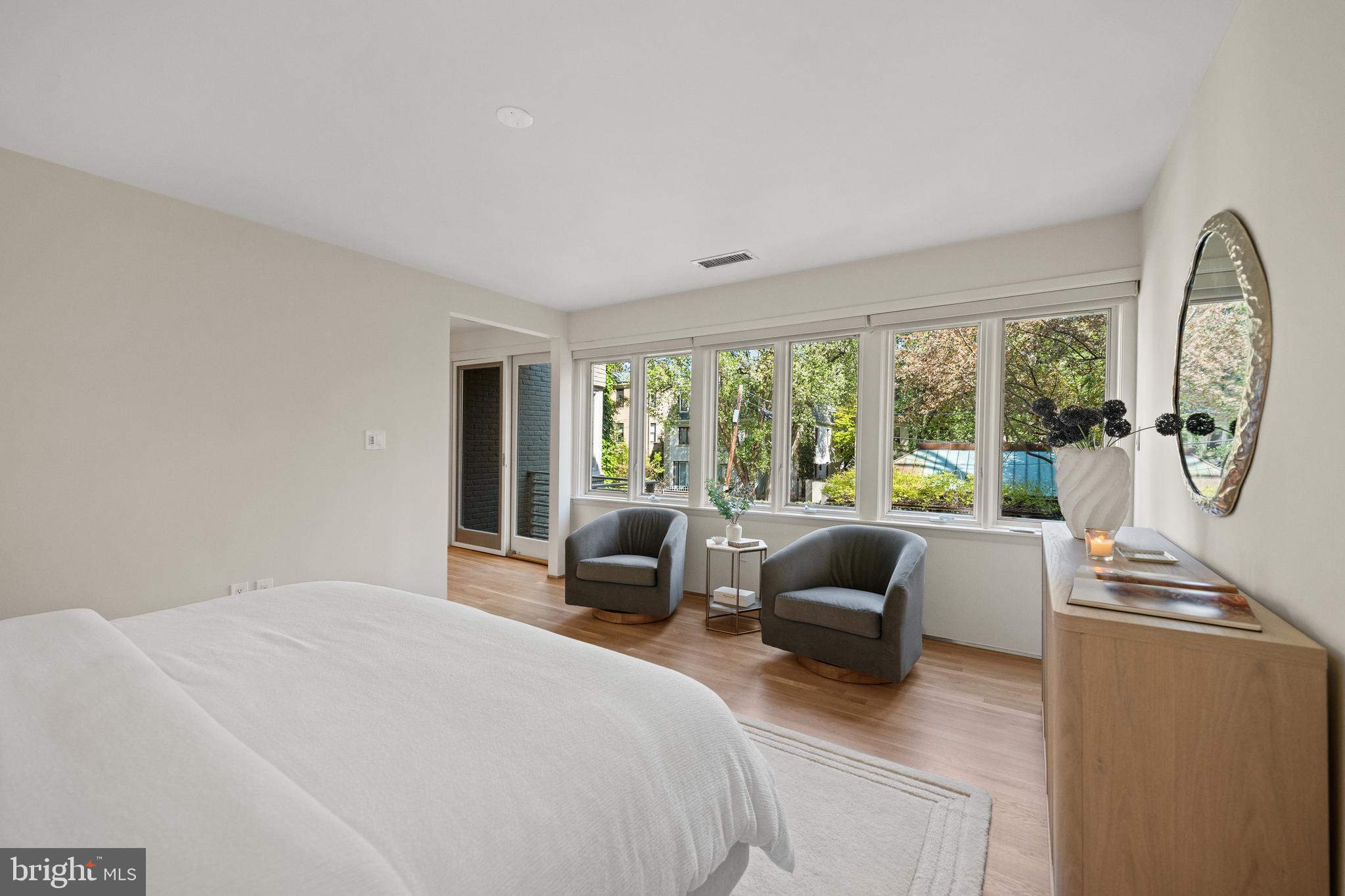 2319 Bancroft Place Northwest Washington, DC 20008 - Photo 15 of 37 a bedroom with furniture and a large window