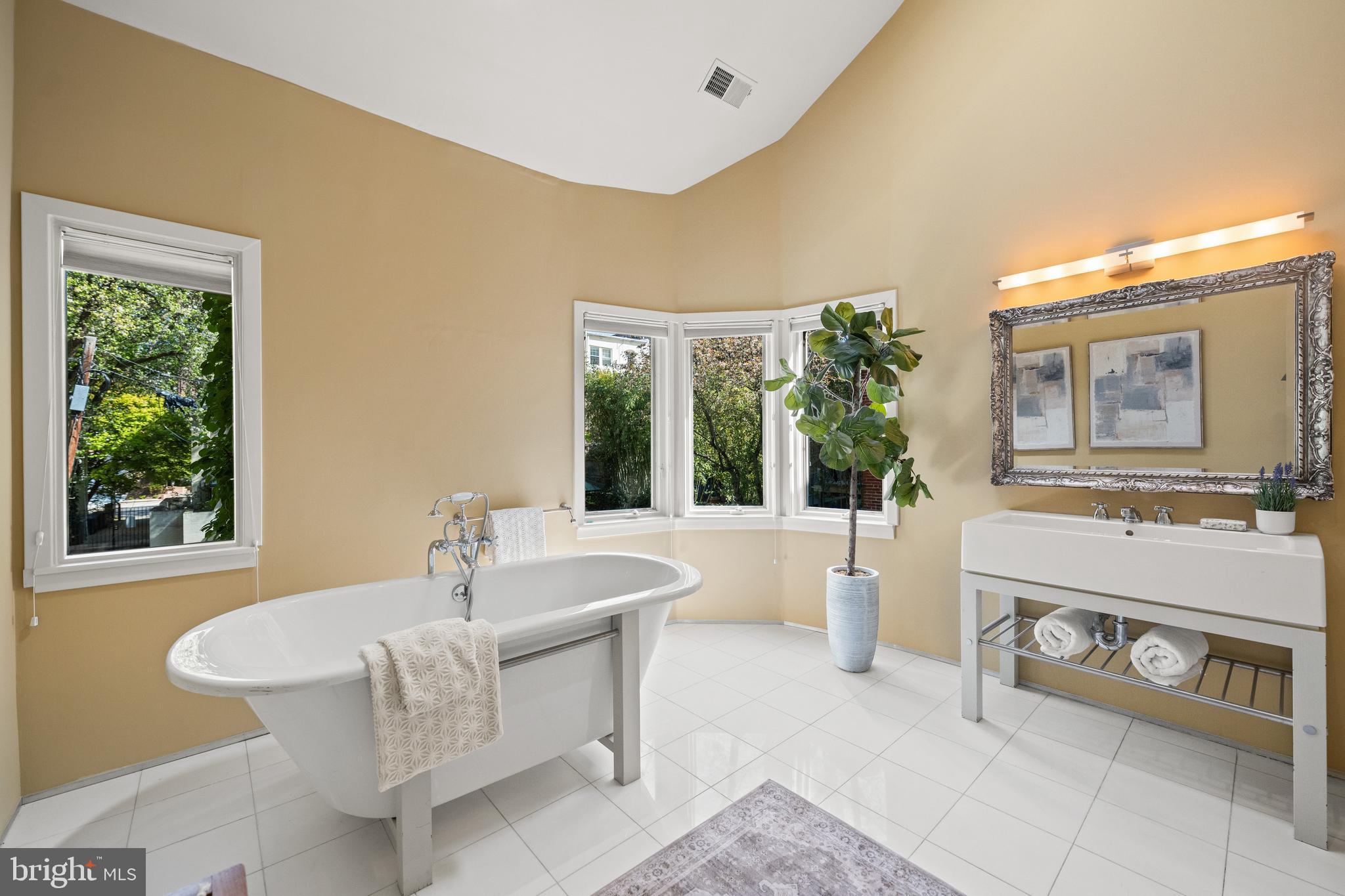 2319 Bancroft Place Northwest Washington, DC 20008 - Photo 16 of 37 a living room with furniture and a large window