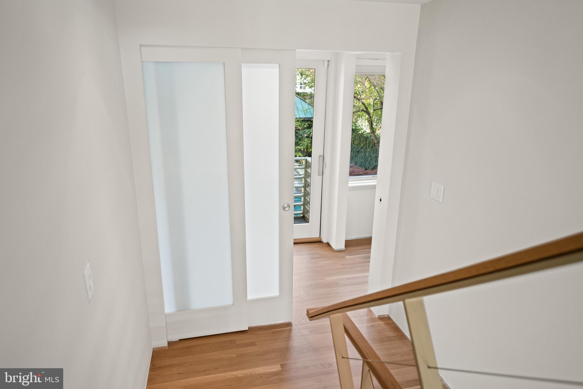 2319 Bancroft Place Northwest Washington, DC 20008 - Photo 18 of 37 a view of wooden floor in a room