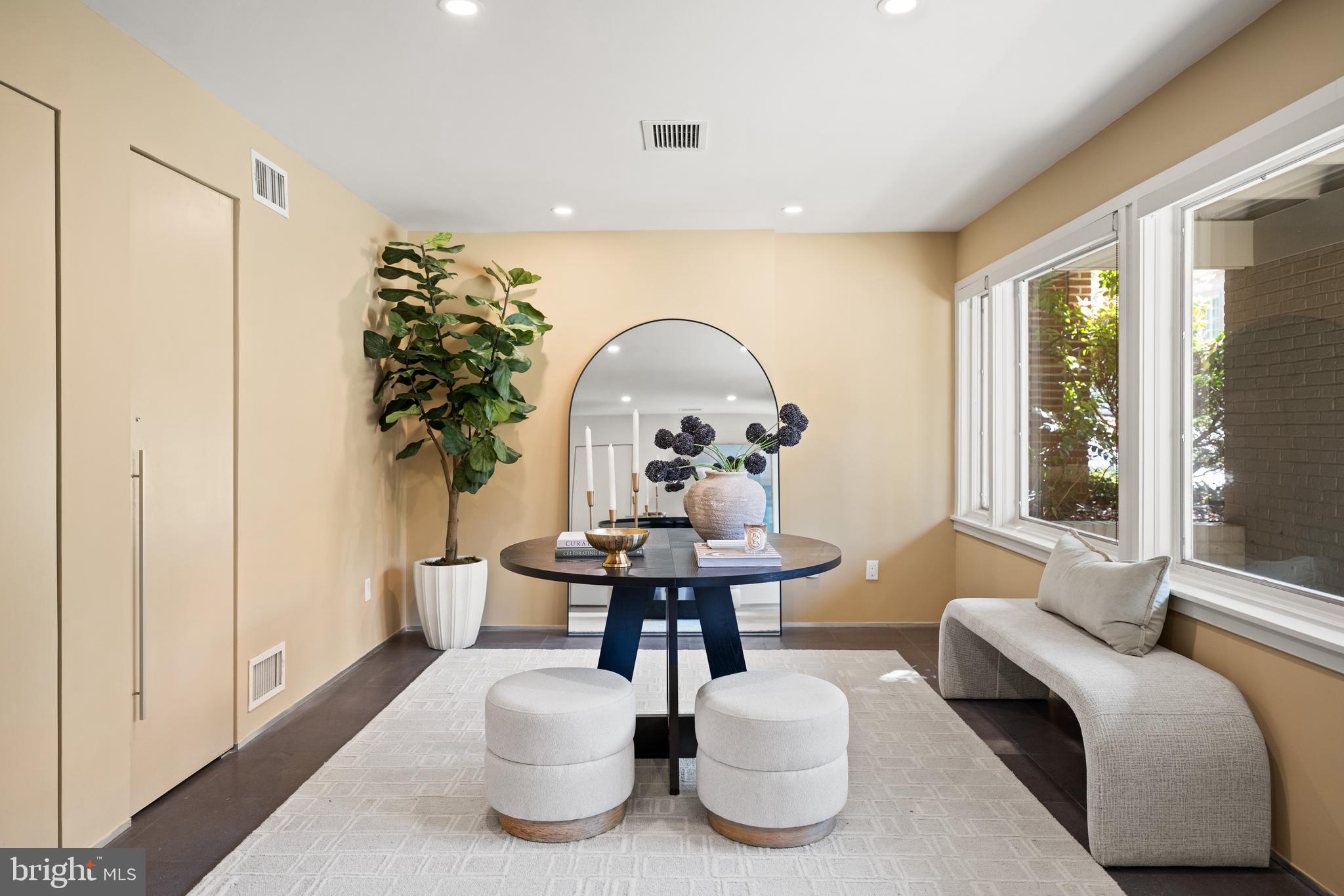 2319 Bancroft Place Northwest Washington, DC 20008 - Photo 2 of 37 a living room with furniture and a potted plant