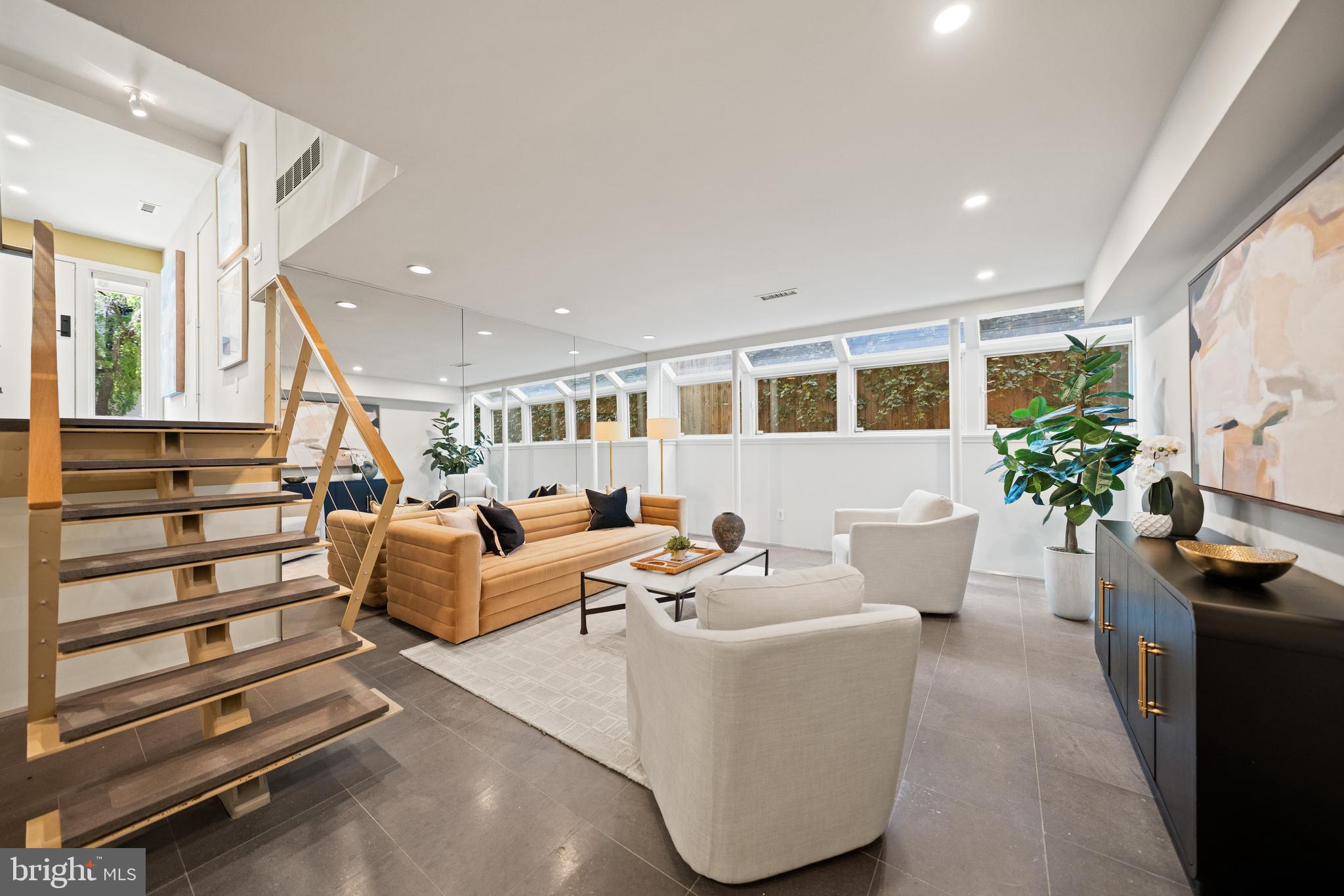 2319 Bancroft Place Northwest Washington, DC 20008 - Photo 31 of 37 a living room with fireplace furniture and a potted plant