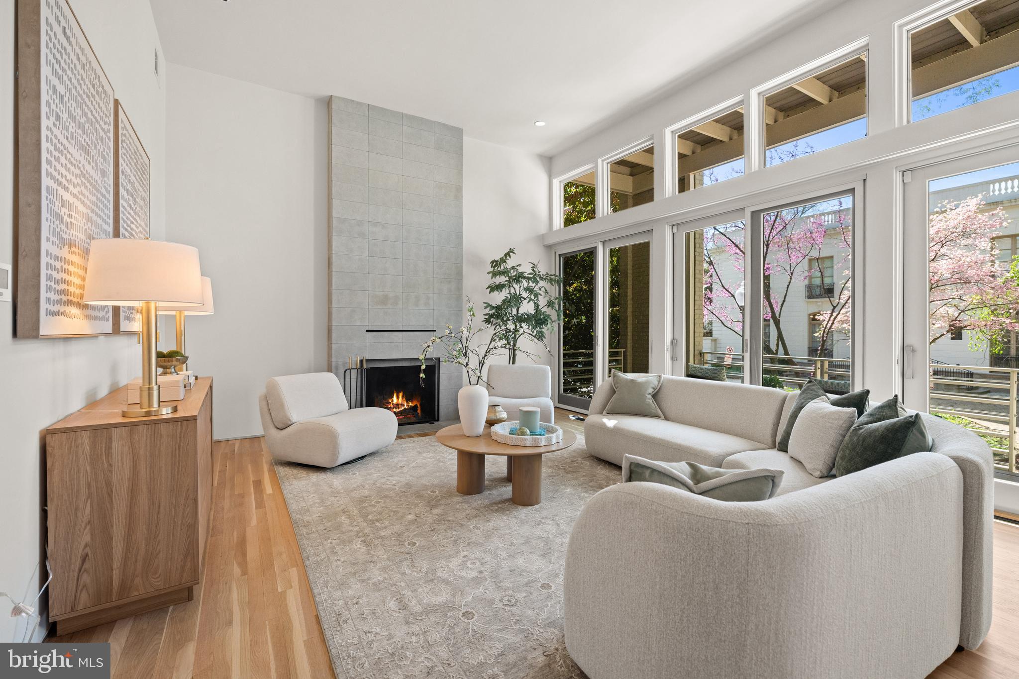 2319 Bancroft Place Northwest Washington, DC 20008 - Photo 10 of 37 a living room with fireplace furniture and a large window