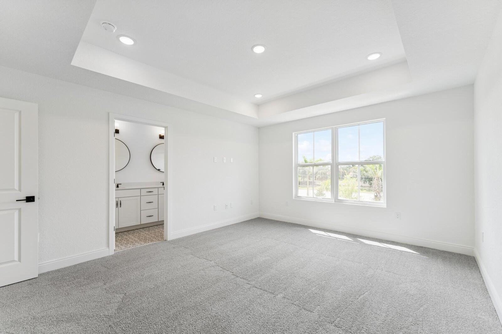 188 Southeast Birch Terrace, Unit 313 Stuart, FL 34997 - Photo 23 of 30 wooden floor in an empty room with a window