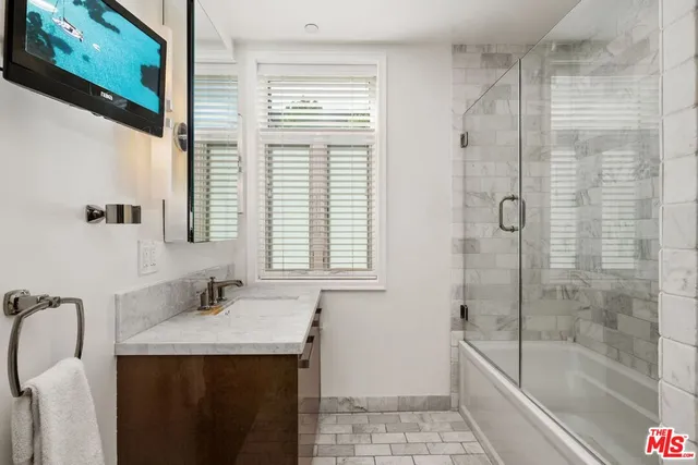 a bathroom with a sink and a bathtub