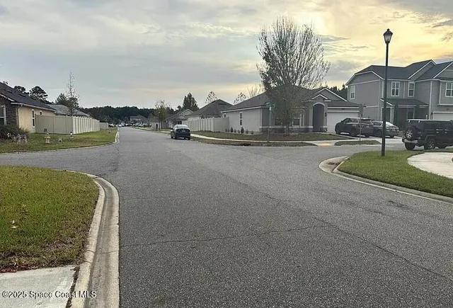 a view of a street with houses