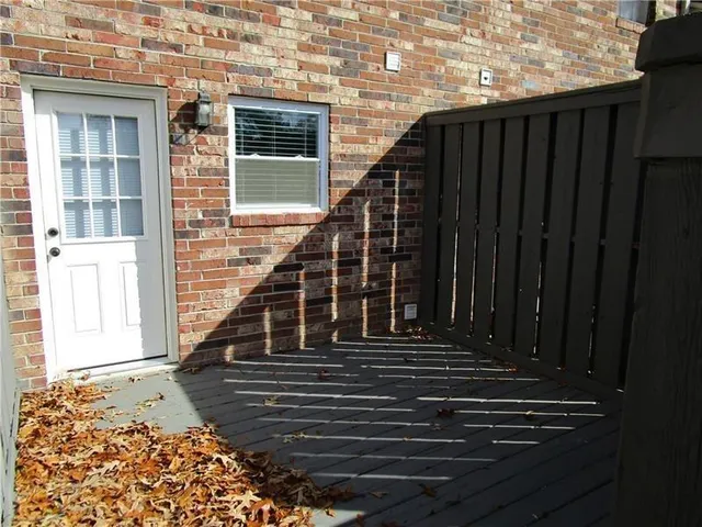 a view of a house with wooden stairs