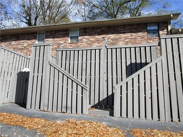 a view of a wooden fence