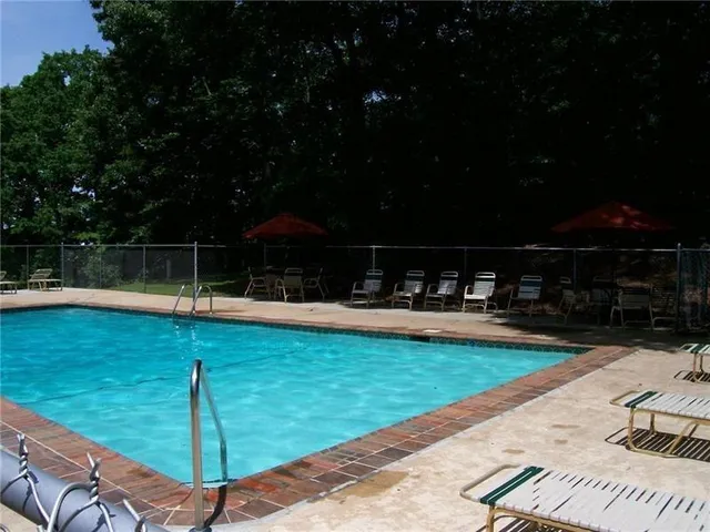 a view of a house with a tree
