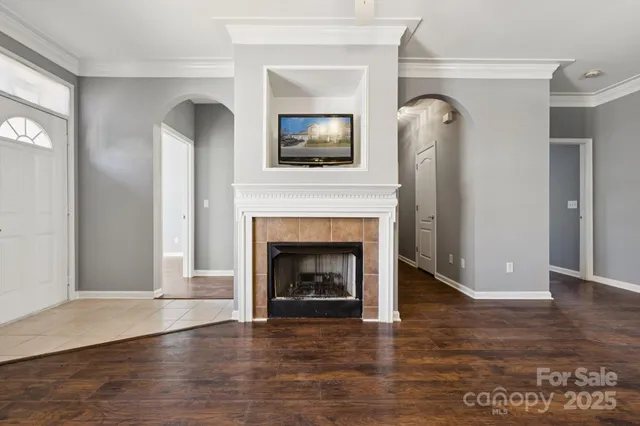 a living room with a fireplace