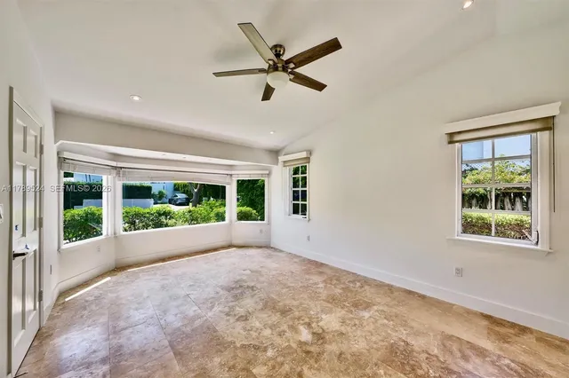 a bathroom with a sink vanity and mirror