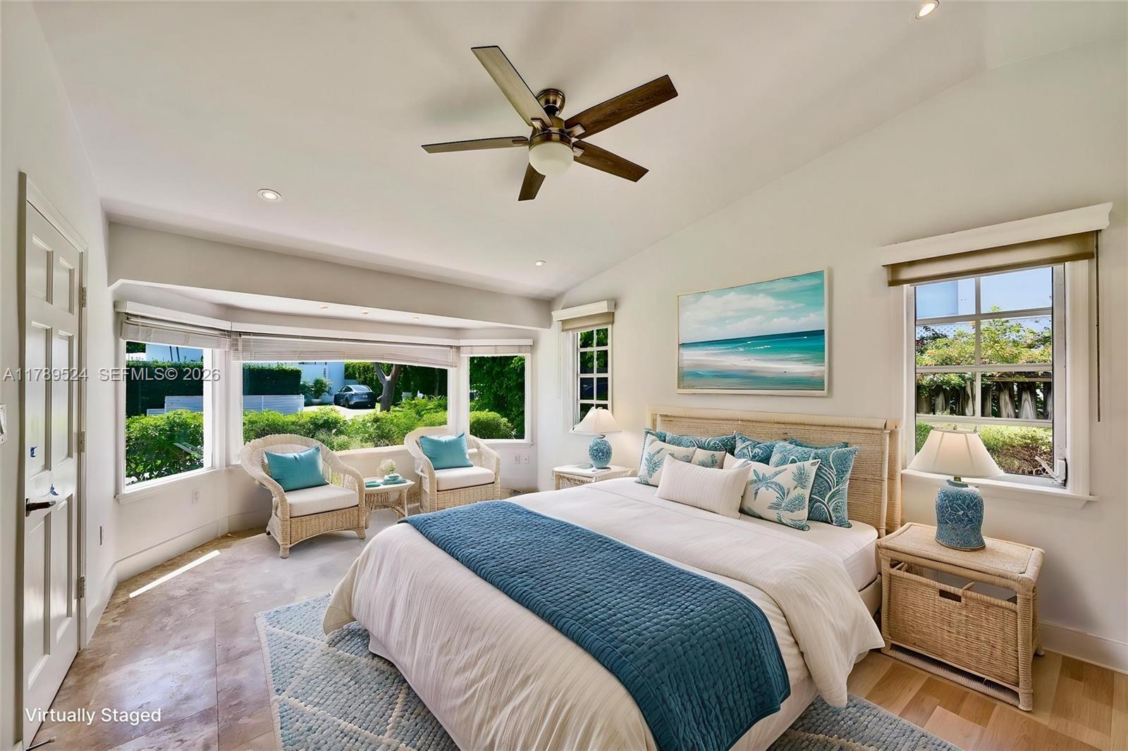 255 Ridgewood Road Key Biscayne, FL 33149 - Photo 24 of 61 a bedroom with a bed and a large window