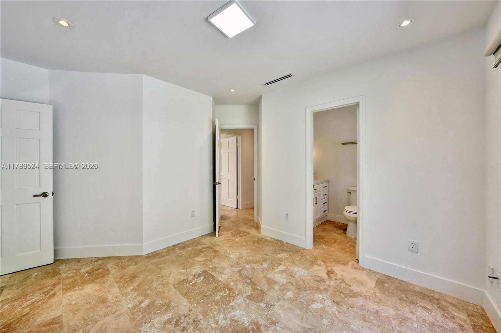 255 Ridgewood Road Key Biscayne, FL 33149 - Photo 42 of 61 a view of an empty room