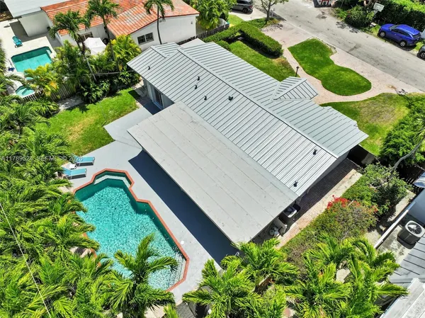 a view of a house with a swimming pool