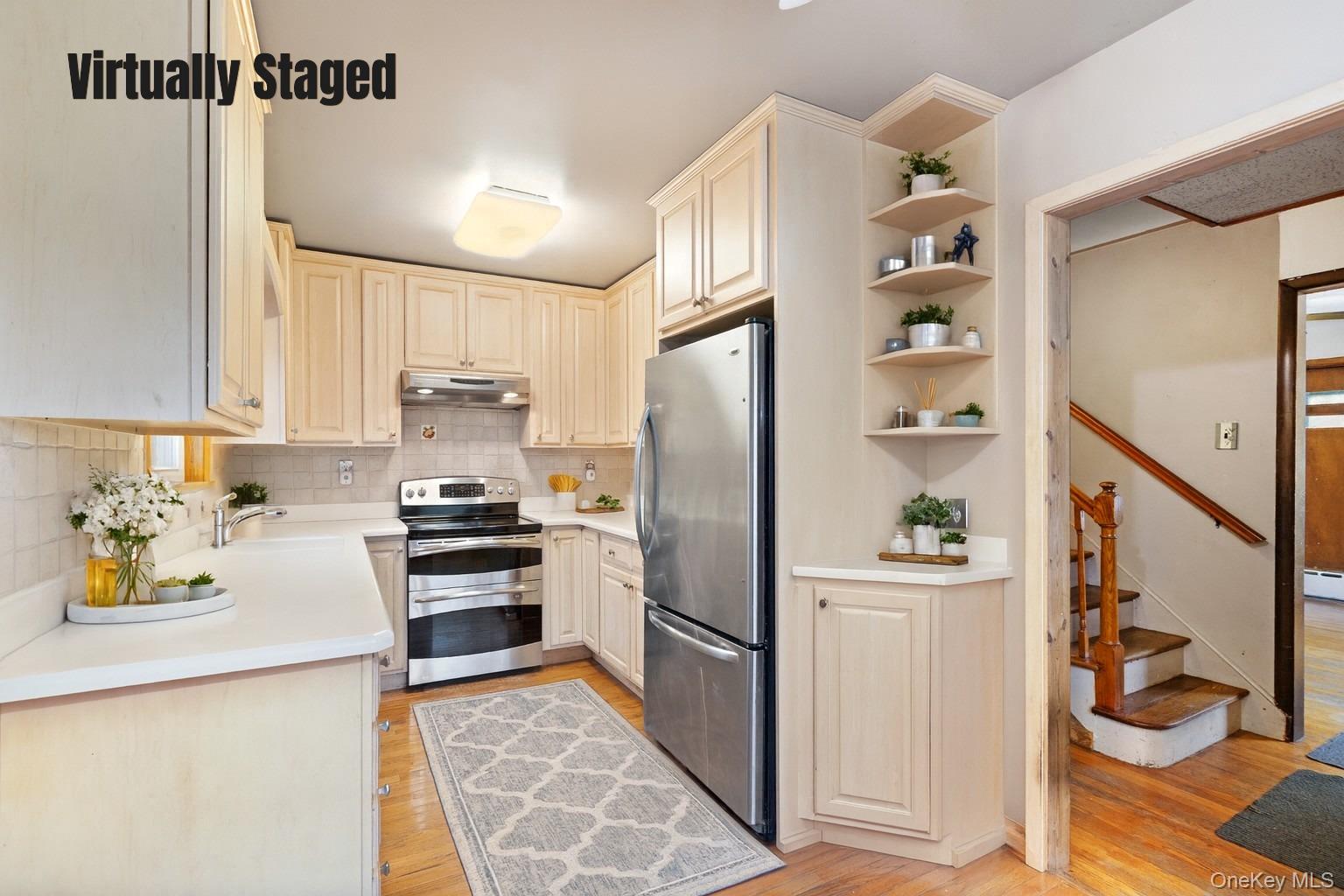 7 Venice Road Patterson, NY 12563 - Photo 13 of 35 a kitchen with granite countertop a refrigerator and a sink