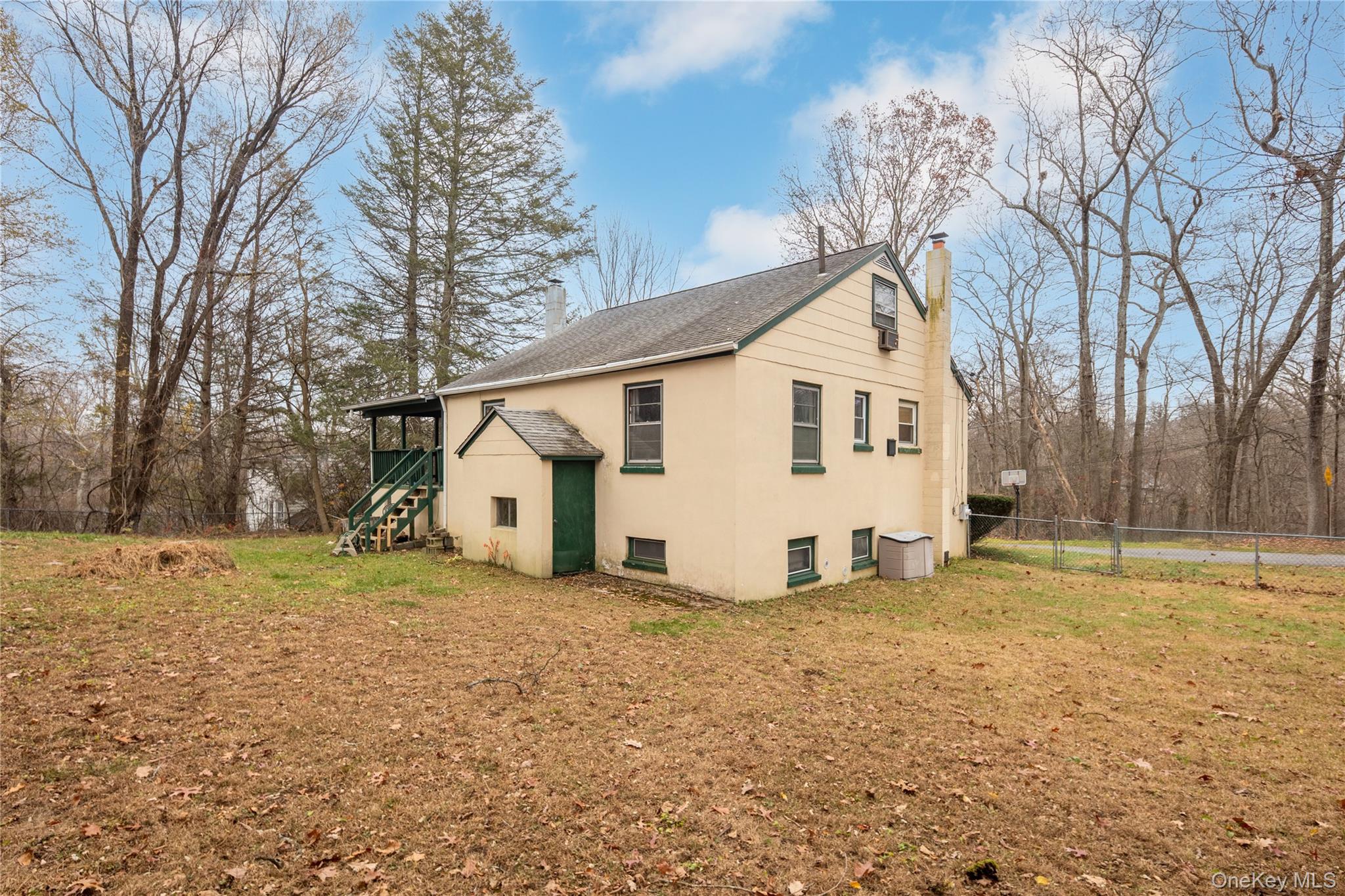 7 Venice Road Patterson, NY 12563 - Photo 29 of 35 a view of a house with a yard covered with snow