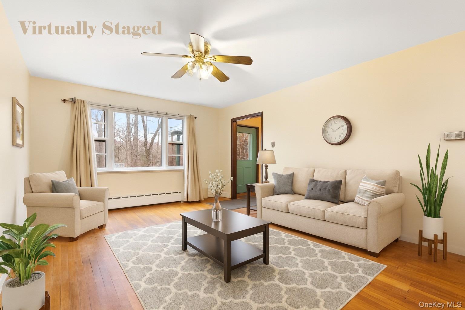 7 Venice Road Patterson, NY 12563 - Photo 9 of 35 a living room with furniture and wooden floor
