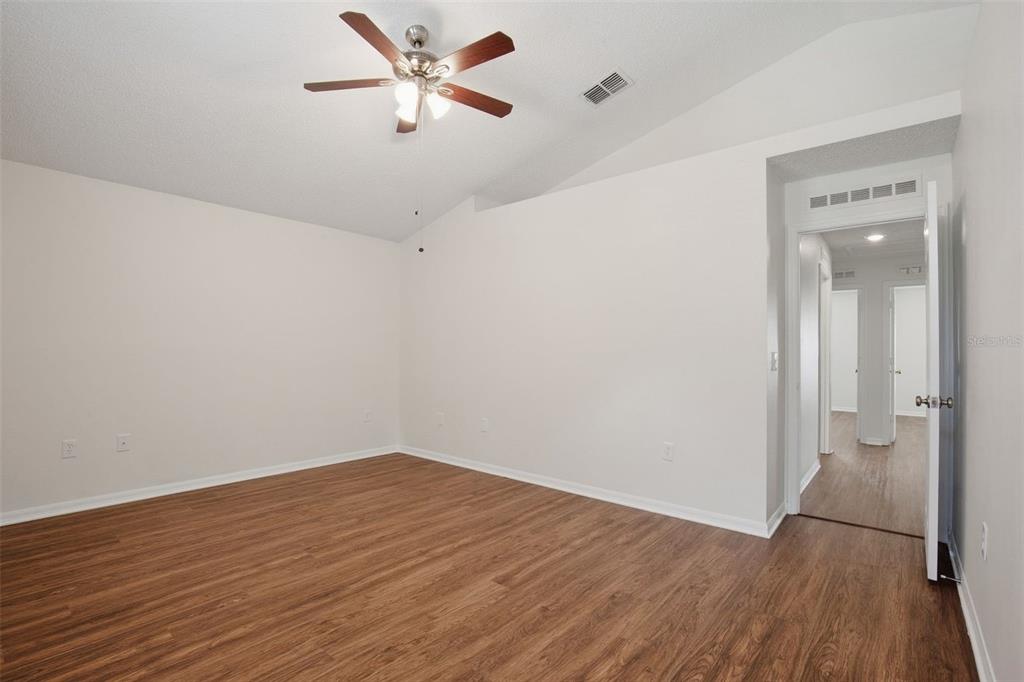 11331 Ivy Flower Loop Riverview, FL 33578 - Photo 18 of 36 wooden floor in an empty room