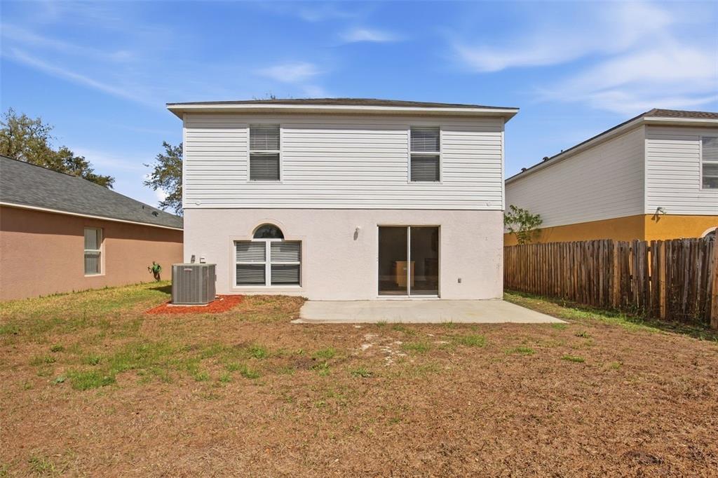 11331 Ivy Flower Loop Riverview, FL 33578 - Photo 33 of 36 a front view of a house with a yard