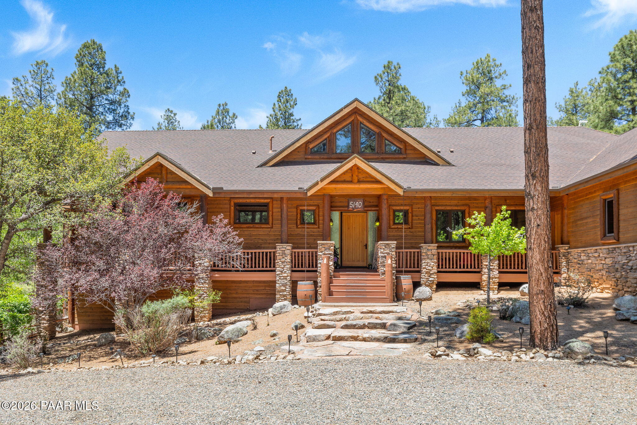 5140 East Charcoal Kiln Road Prescott, AZ 86303 - Photo 6 of 140 a front view of a house with a yard