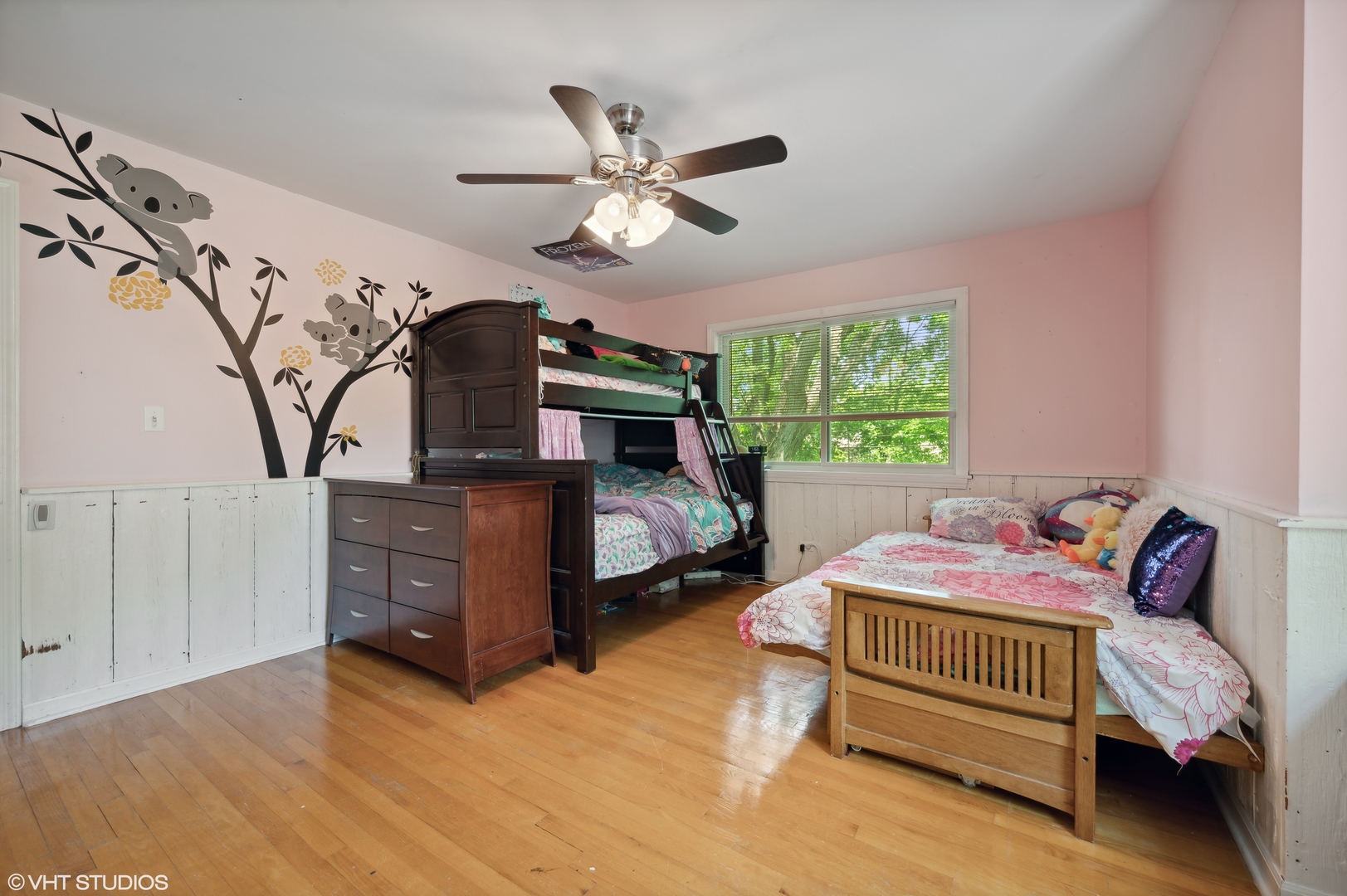 2224 Maple Avenue Northbrook, IL 60062 - Photo 15 of 25 a bedroom with a bed and a chandelier