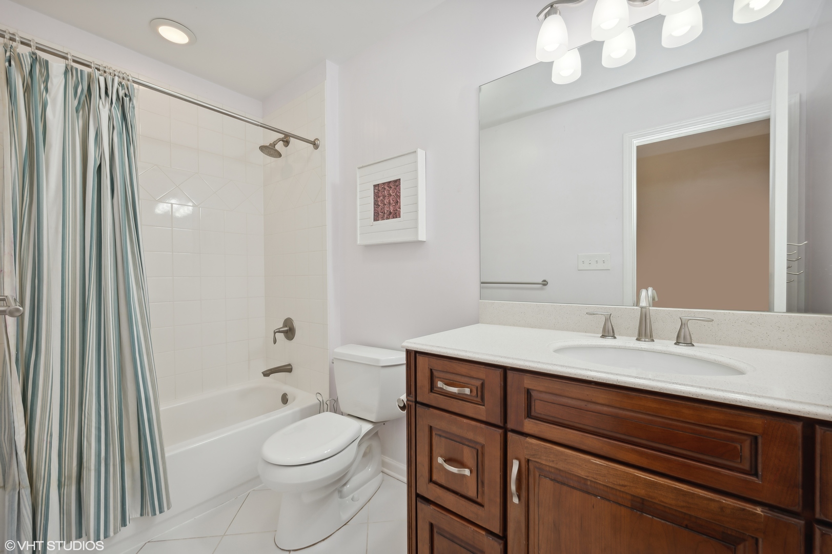 2224 Maple Avenue Northbrook, IL 60062 - Photo 16 of 25 a bathroom with a sink a toilet and shower
