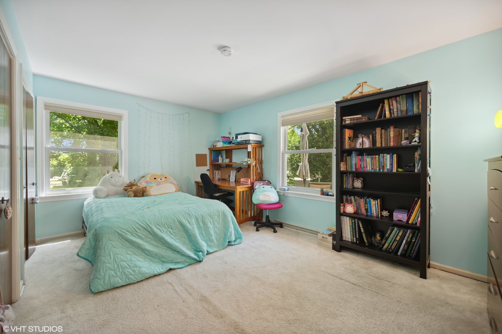 2224 Maple Avenue Northbrook, IL 60062 - Photo 19 of 25 a bed room with a bed and a book shelf