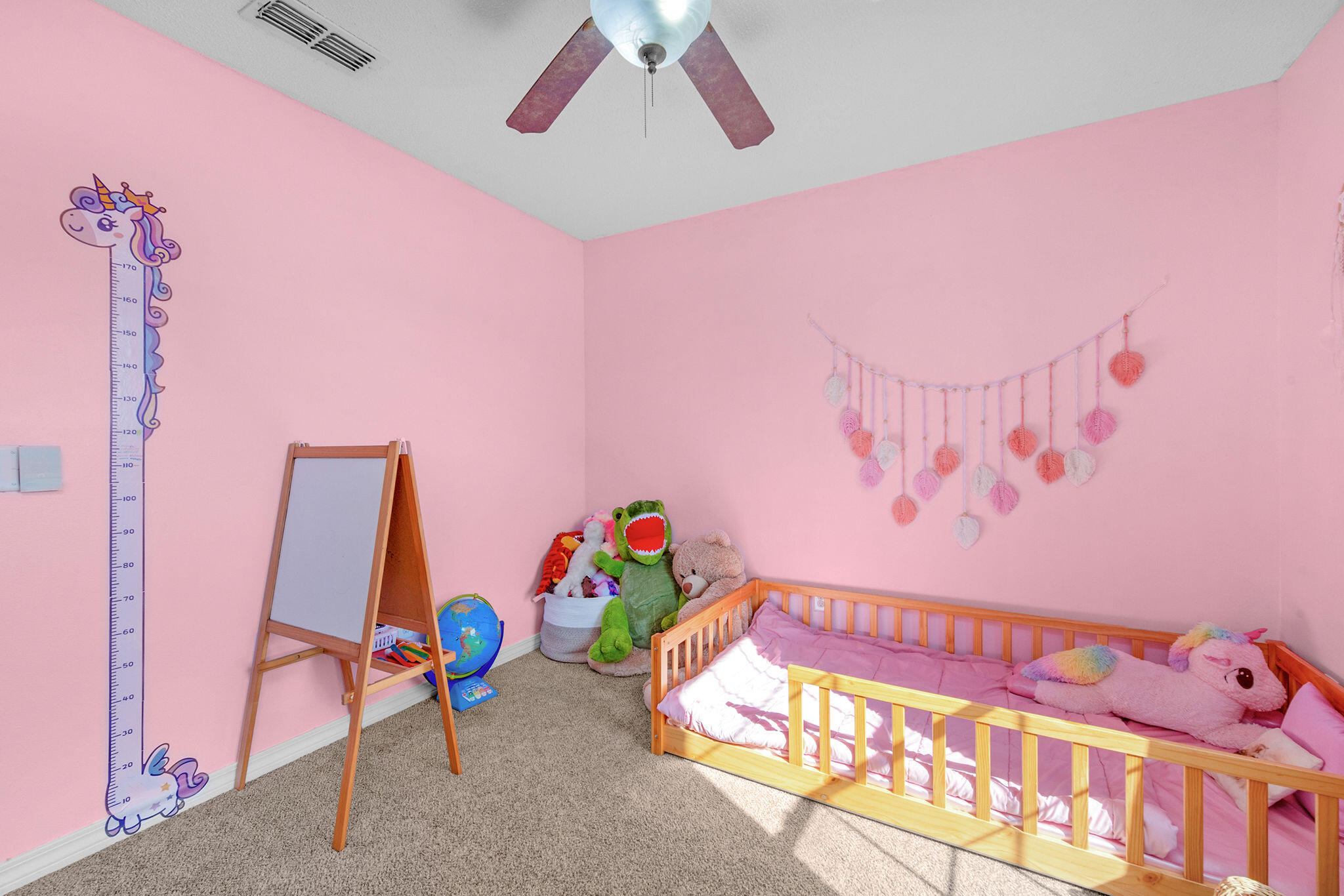 404 Bobby Drive Crestview, FL 32536 - Photo 16 of 30 a view of a room with furniture and toys