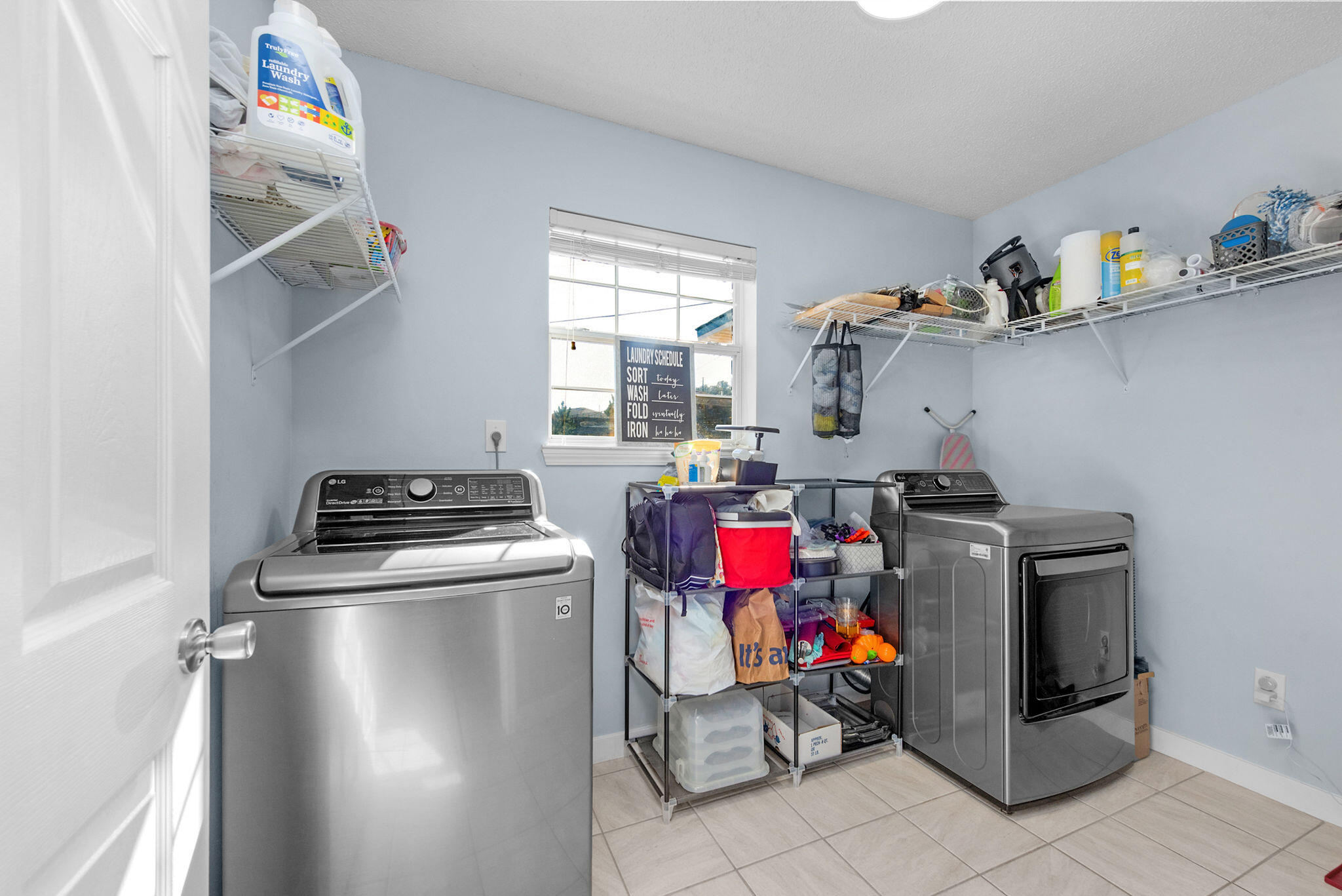 404 Bobby Drive Crestview, FL 32536 - Photo 19 of 30 a utility room with dryer and washer