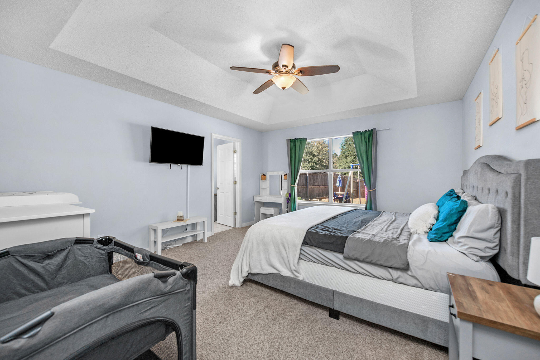 404 Bobby Drive Crestview, FL 32536 - Photo 21 of 30 a living room with furniture and a flat screen tv