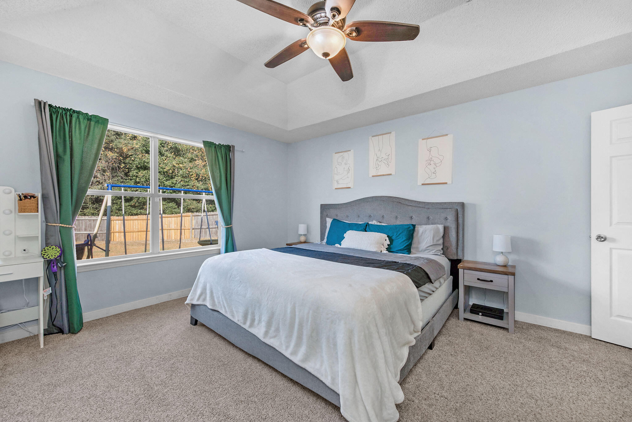 404 Bobby Drive Crestview, FL 32536 - Photo 22 of 30 a bedroom with a bed and a large window