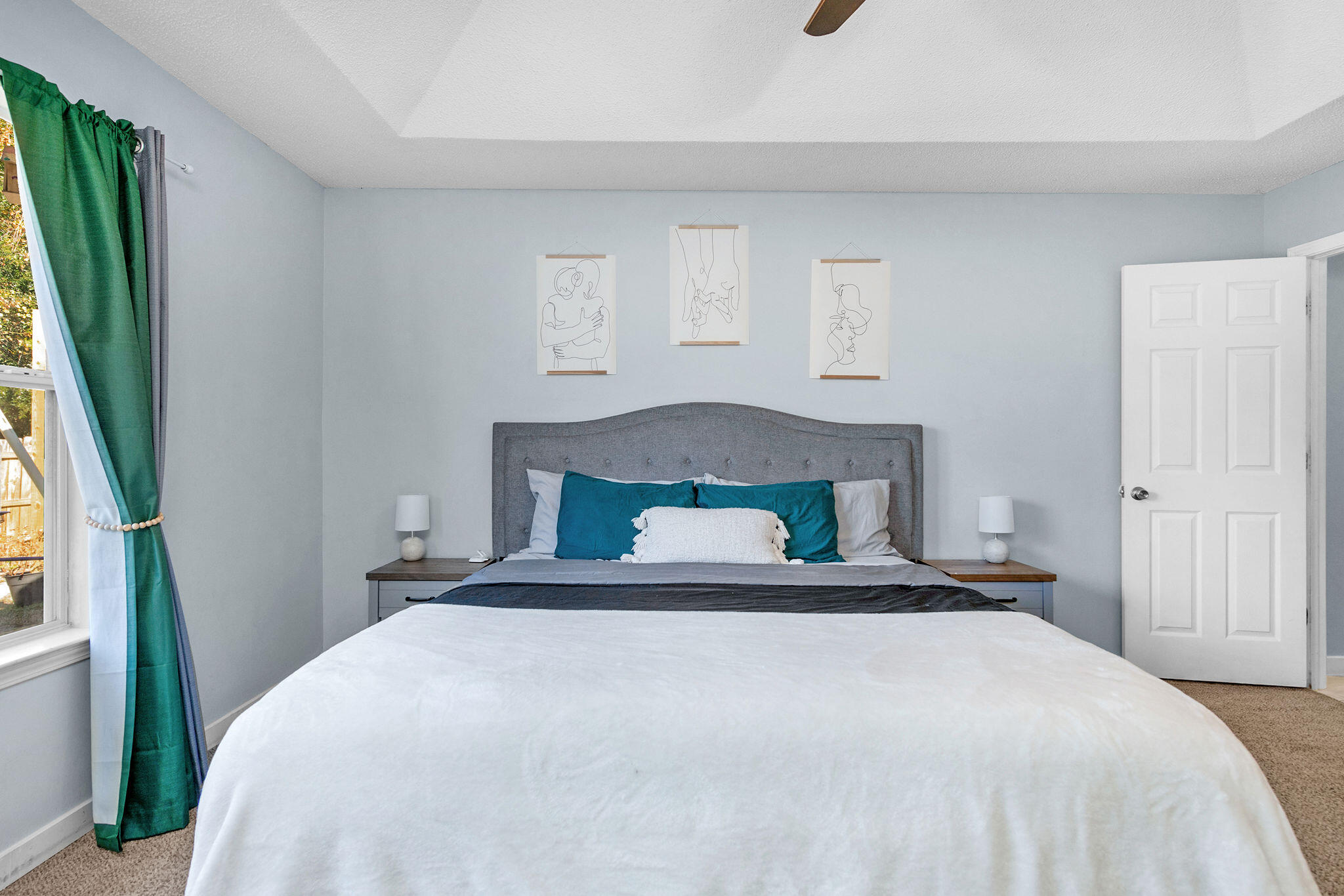 404 Bobby Drive Crestview, FL 32536 - Photo 23 of 30 a bedroom with a bed and a window