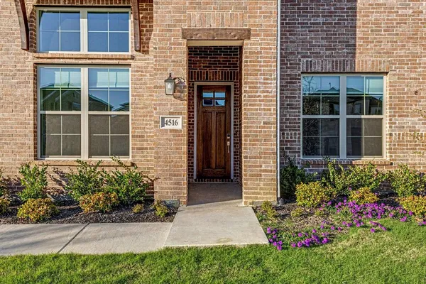a front view of a house having yard