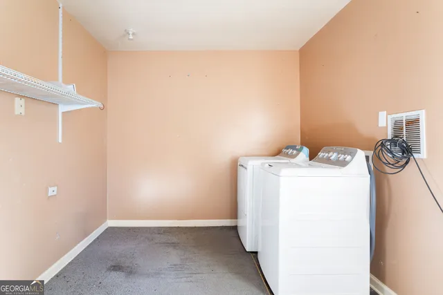 a bathroom with a sink toilet and mirror