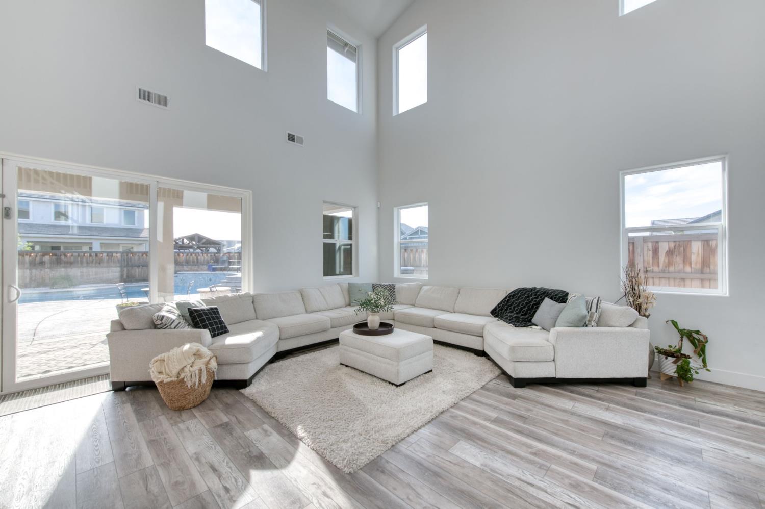1736 North Renn Avenue Clovis, CA 93619 - Photo 6 of 66 a living room with furniture and a large window