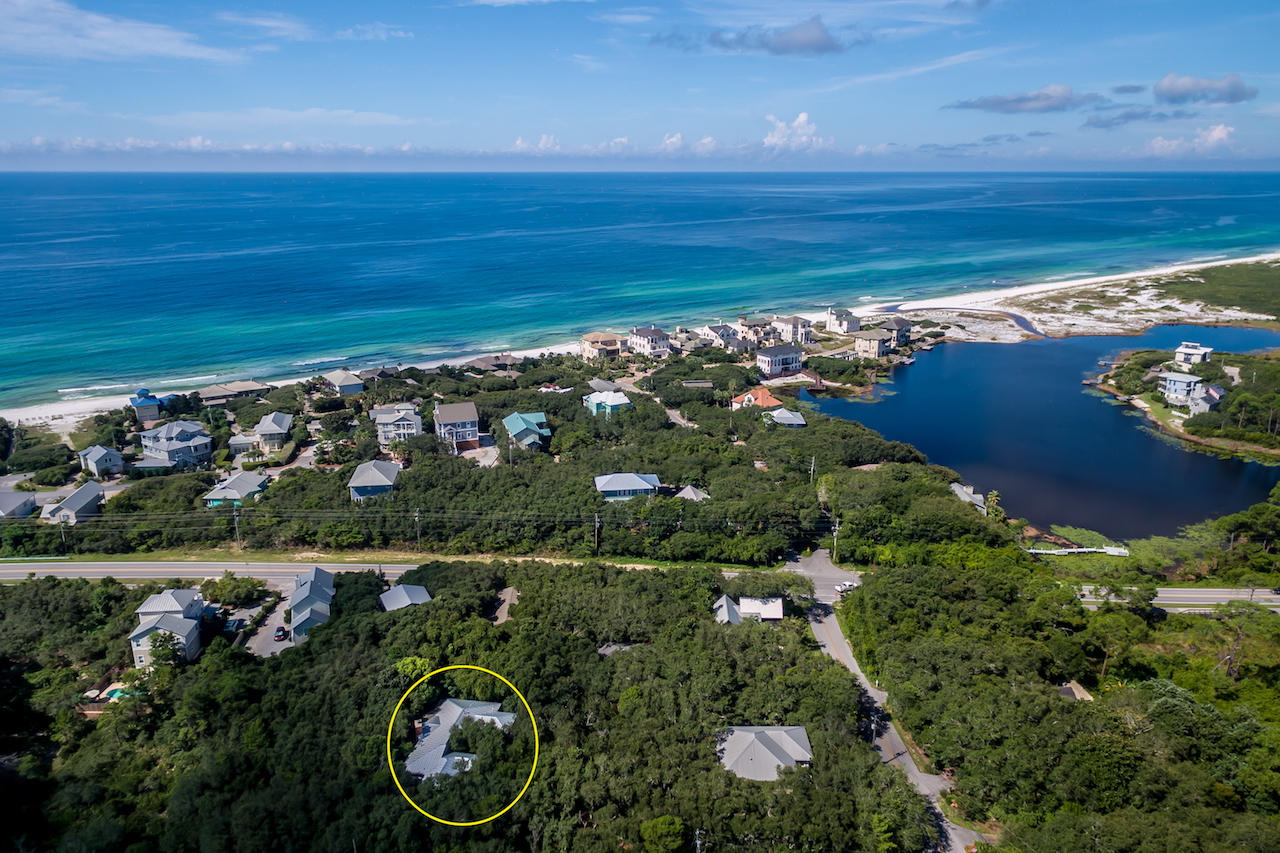 245 Baird Road Santa Rosa Beach, FL 32459 - Photo 1 of 44 a view of a garden